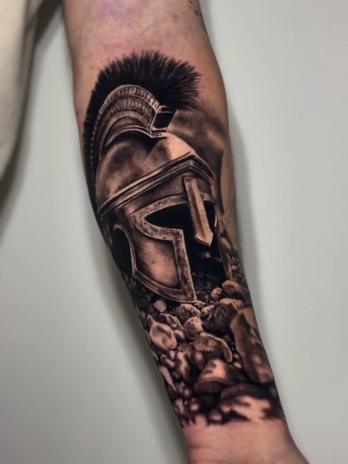 Casco espartano, antebrazo